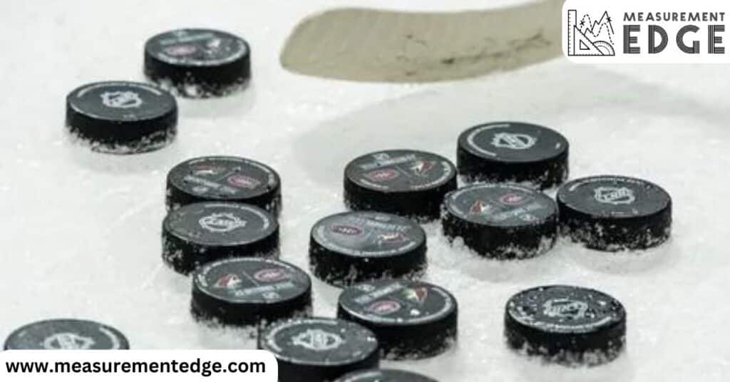 12 Hockey Pucks